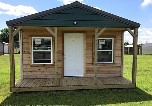 Front view of brown cabin | McLain, OK