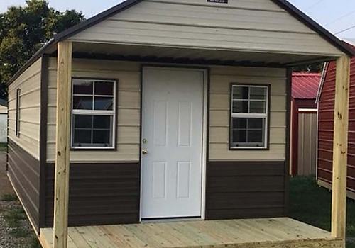 Frot view of brown metal cabin in Bixby, OK